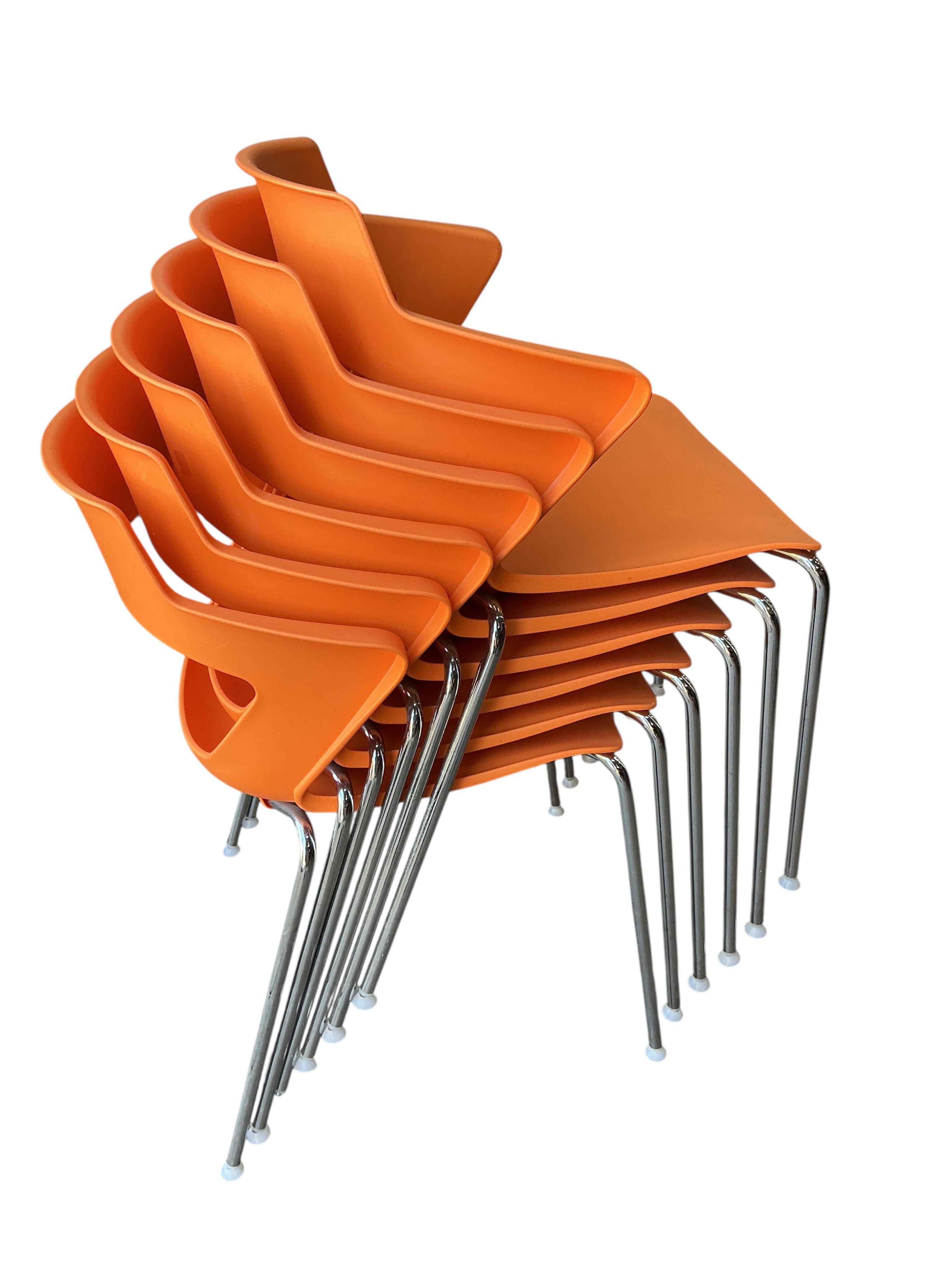 Paolo Lucidi and Luce Pevere for Elite, a set of six orange stacking chairs, width 55cm, depth 46cm, height 78cm